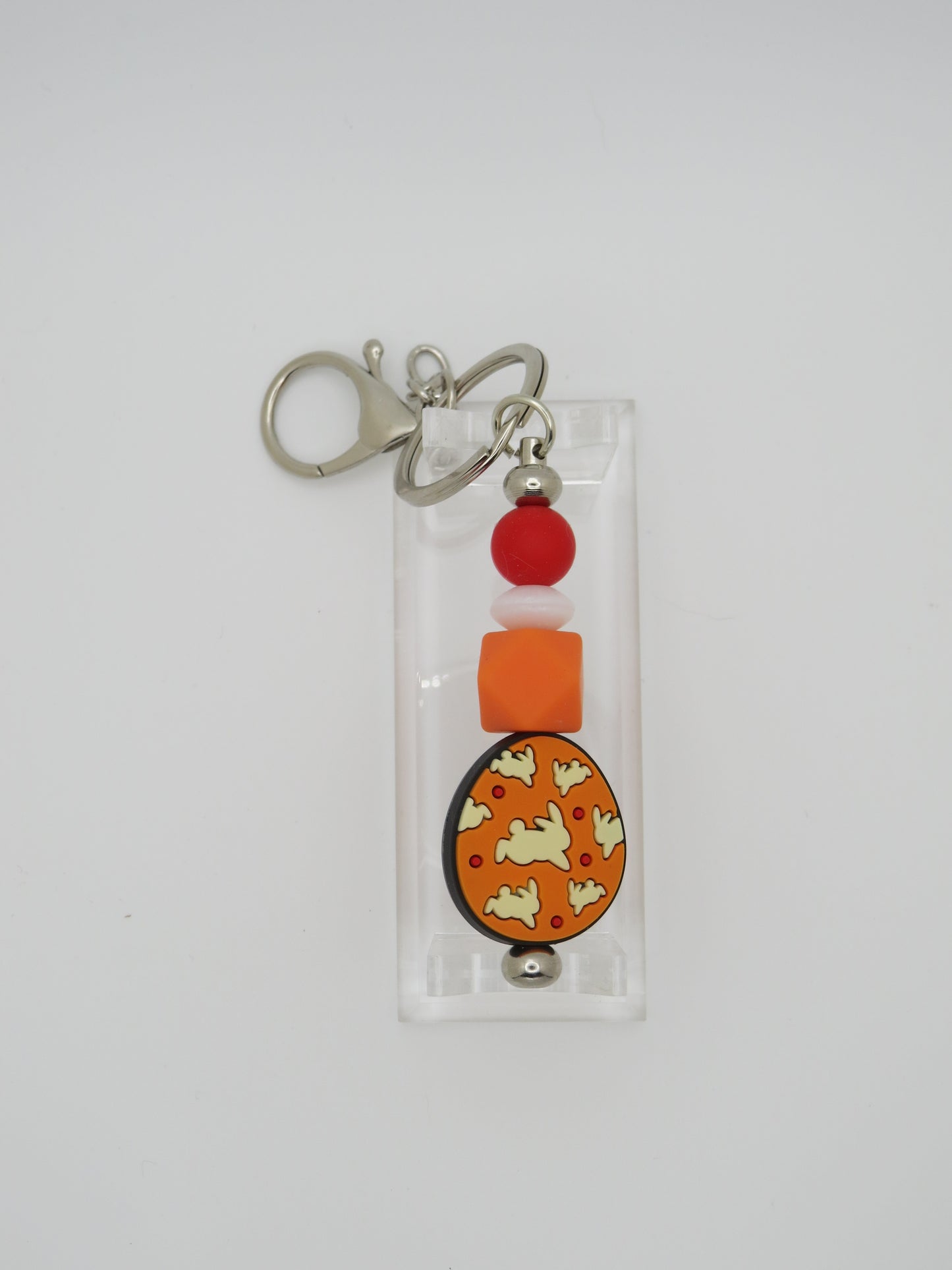 Orange Egg with White Bunnies